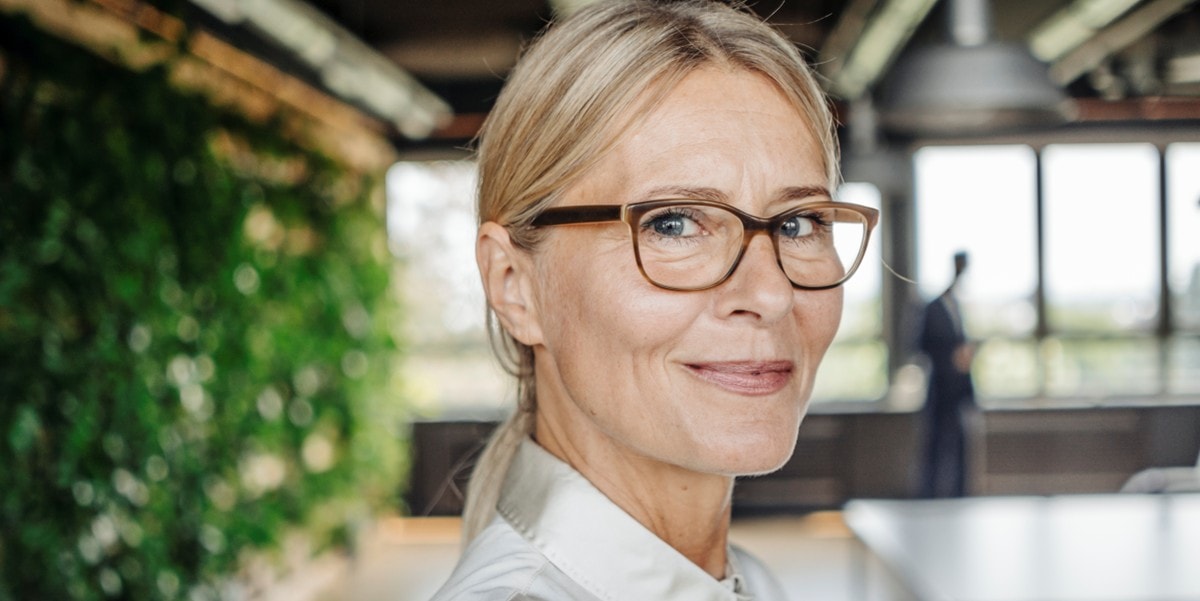 professional woman in office smiling