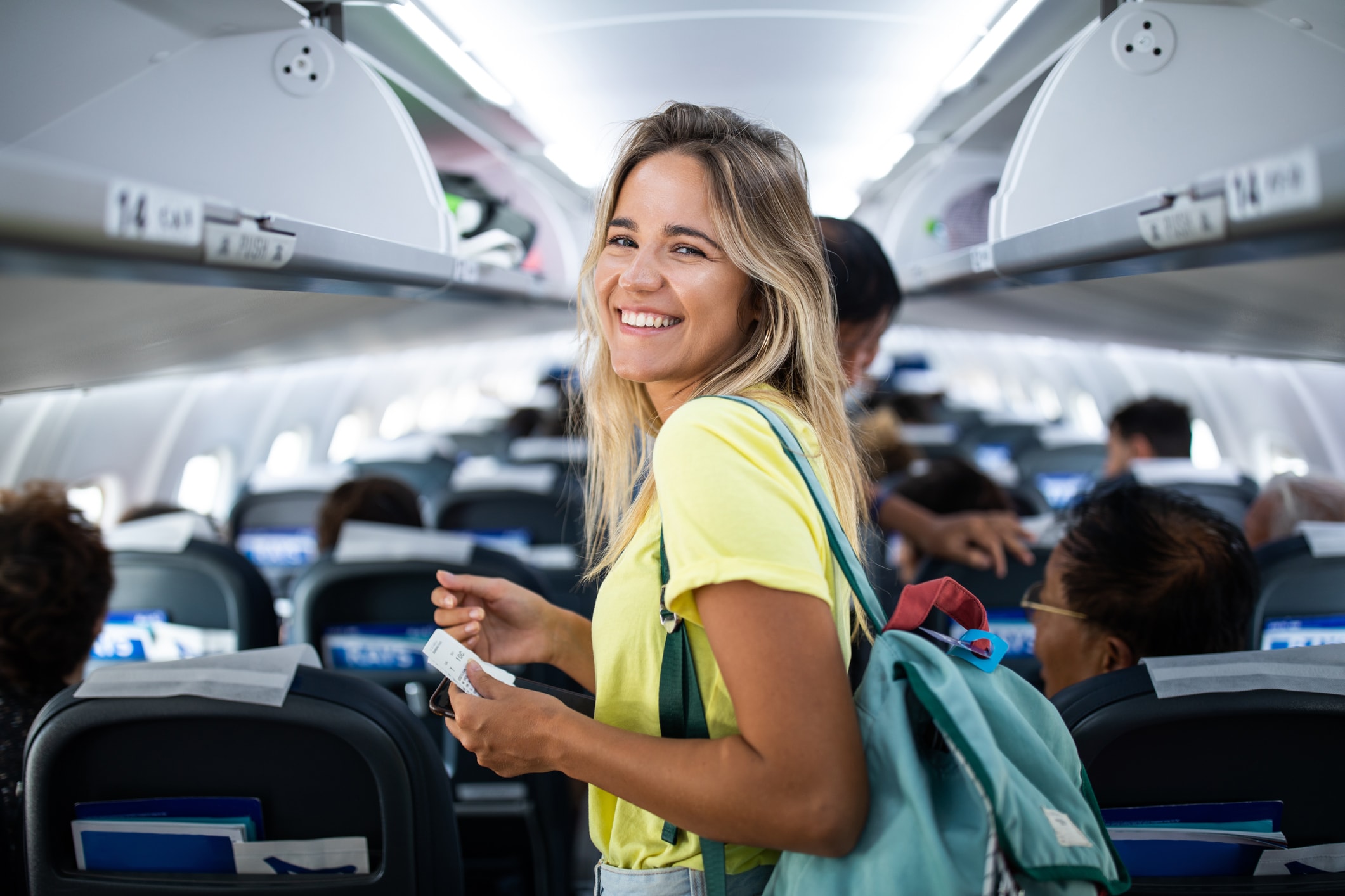 Woman boarding airplane