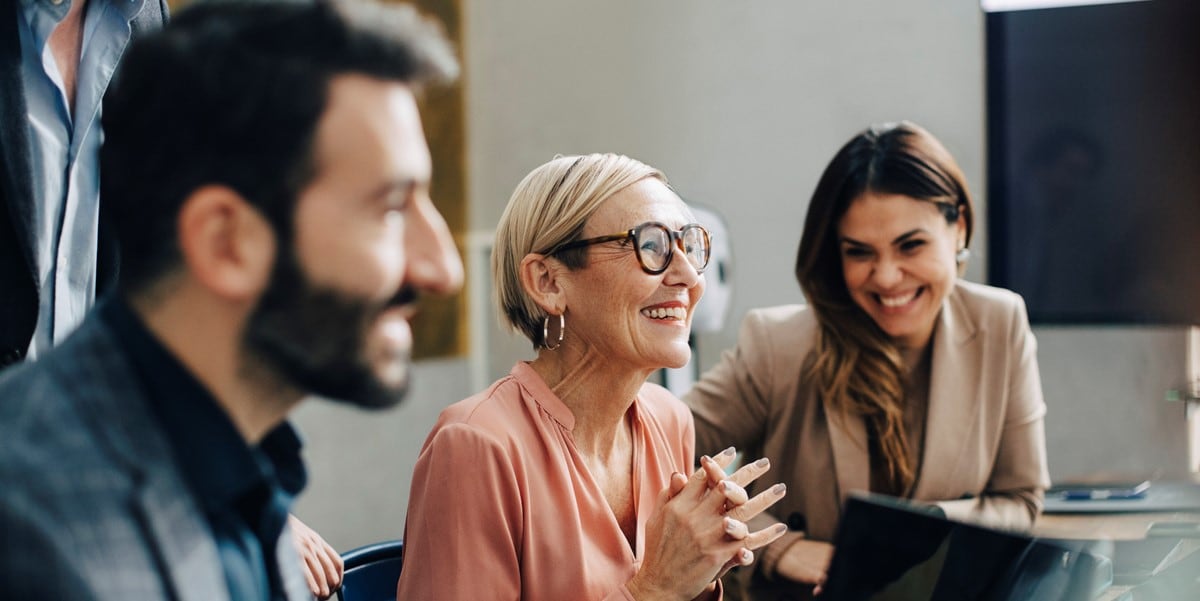 3 people meeting in office