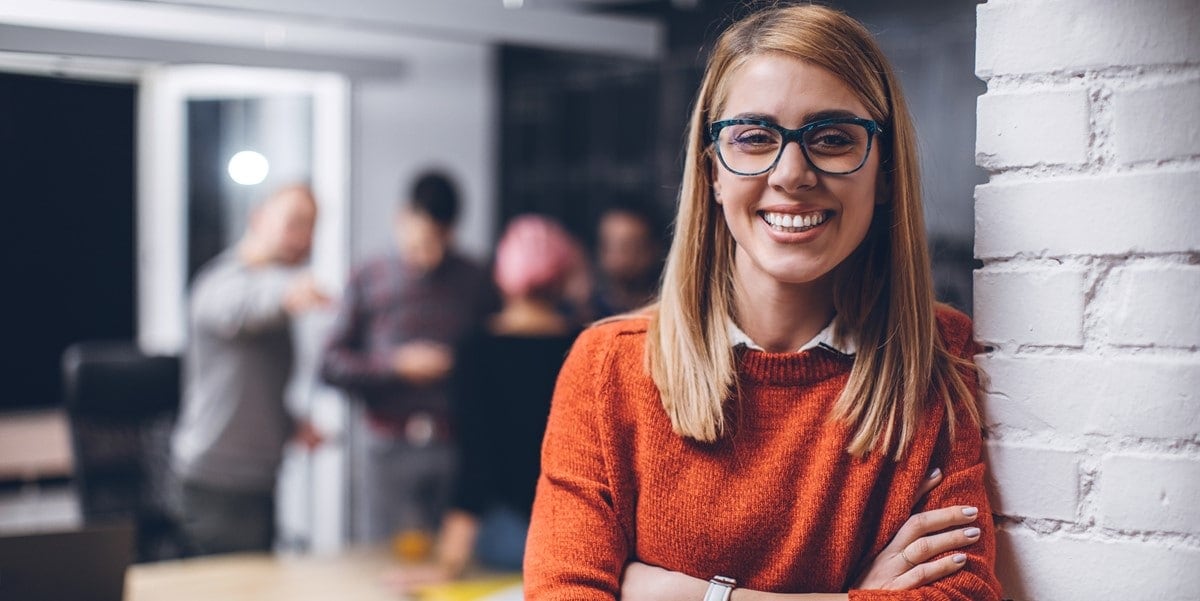 professional woman in office smiling
